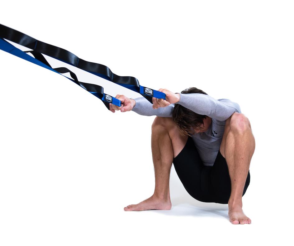 man using mobility stretching strap